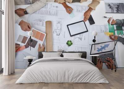 Architect, hands and blueprint design in meeting above for planning, strategy or architecture on office desk. Top view of creative people in team project or floor plan with color palette for startup Wall mural