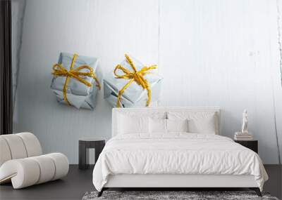 Silver colored gift box on white wood Wall mural