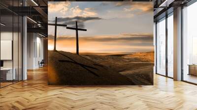 three wooden crosses on a hill in the morning. concept of crucifixion on mount golgotha, resurrectio Wall mural