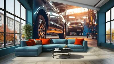 Car repair service. Auto mechanic repairing car in auto repair shop Wall mural