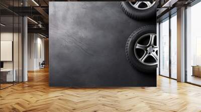 Car tires on black background. Top view with copy space Wall mural