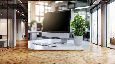 Minimalist white desk with a computer and office background, blurred business center interior in the blurred background. Mockup for design or presentation Wall mural