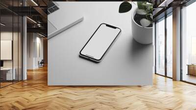 Smartphone with blank screen on bright background. Mockup for design Wall mural