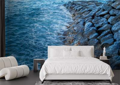 Ocean Wave Surging Against Rocks in Hawaii. Wall mural