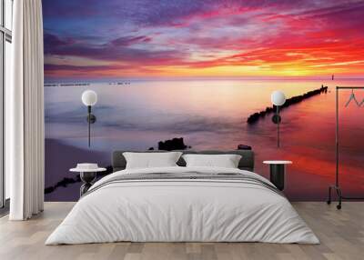 Baltic sea at beautiful sunrise in Poland beach. Wall mural