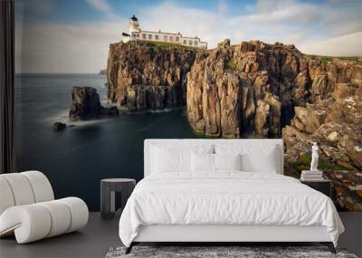 Neist Point Lighthouse on Isle of Skye in Scotland, Coast landscape with ocean Wall mural