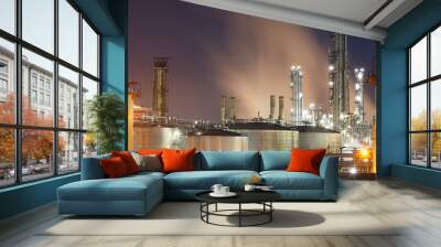 Oil and gas refinery at twilight - Petrochemical factory Wall mural