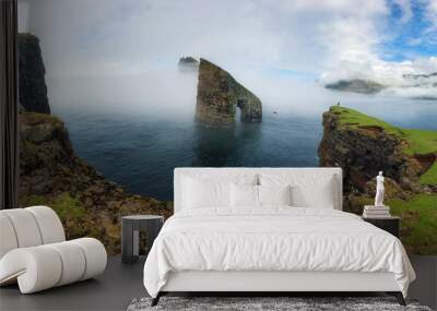 The beautiful Drangarnir Arch on the Faroe Islands, Atlantic ocean landscape with cliff Wall mural