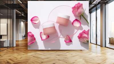 Mockup scene for cosmetic of rose extract with two pink cream jars on round acrylic sheets on white background with fresh rose and rose petals. Space for design, branding product Wall mural