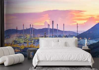 Oil refinery and oil thank with sunset sky Wall mural