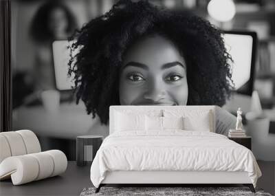 Joyful African American woman participating in an inclusive and diverse remote video team call representing modern remote work culture flexibility and values of diversity equity and inclusion Wall mural