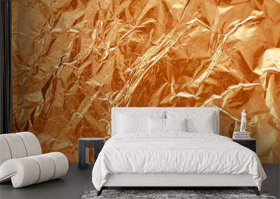 Shiny brown foil texture background, pattern of wrapping paper with crumpled and wavy. Wall mural