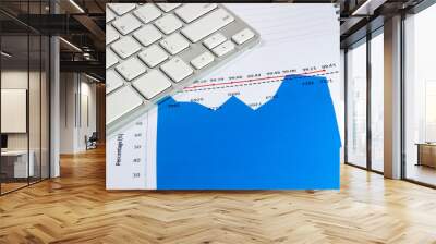 financial graph chart with notebook and keyboard. business concept Wall mural