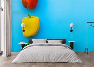 Summer of sweet bell pepper on blue background. Wall mural