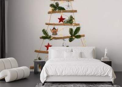 Christmas creative decoration - homemade wooden hanging christmas tree on the wall Wall mural