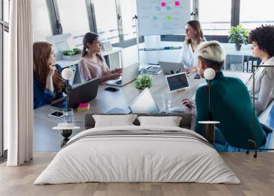 Businesswomen during meeting in an office Wall mural