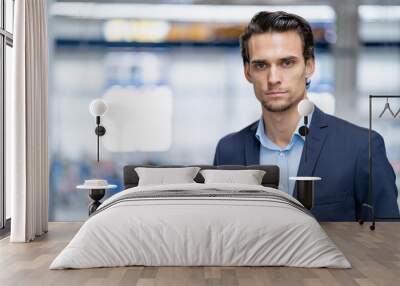 Portrait of confident businessman in a factory Wall mural