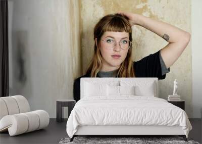 Portrait of female student with tattoo Wall mural