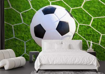 soccer ball in goal net Wall mural