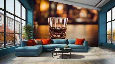 A glass of whiskey in an elegant bar. Enjoy the dim lights at night time. Wall mural