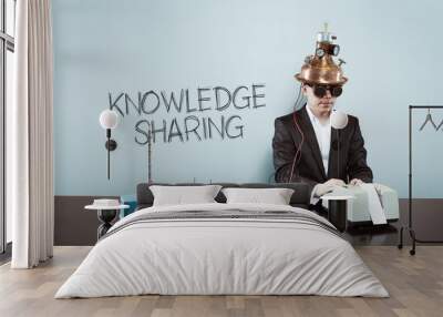 Knowledge is sharing concept with vintage businessman and calculator Wall mural