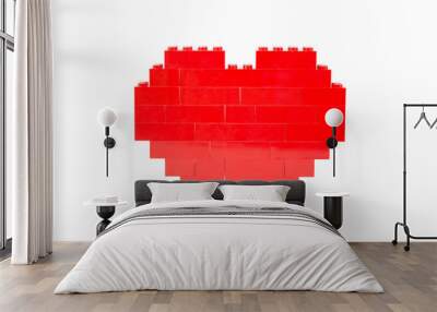 Red heart made of toy building bricks, viewed from the front. Isolated on white background. Wall mural