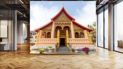 Wat Ong Teu Mahawihan (Temple of the Heavy Buddha), a Buddhist monastery, in Vientiane, Laos, on a sunny day. Wall mural