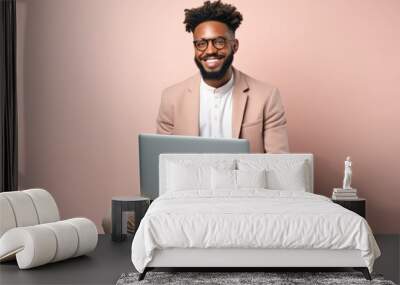 A young black businessman using a laptop and smiling. Generative AI. Wall mural