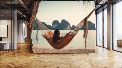 A young woman relaxing in a hammock at the beach. Summer holidays vacations illustration concept. Generative AI. Wall mural