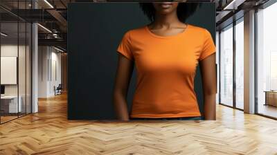 Black woman model wearing a plain orange short sleeved t-shirt, isolated on a blank background. Mock-up, torso only. Generative AI illustration. Wall mural