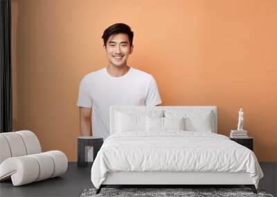 Fictional young asian male model wearing a plain white t-shirt. Isolated on colored background. Generative AI illustration. Wall mural