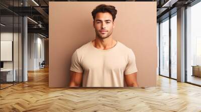 Portrait of a muscular handsome guy wearing a plain t-shirt, isolated on a pastel background. Generative AI illustration. Wall mural