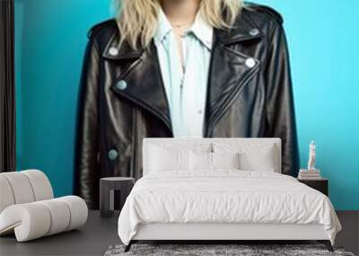 Studio portrait of a fictional blonde model standing on a plain blue background. Rocker girl wearing leather jacket and grunge chic clothes. Generative AI illustration. Wall mural