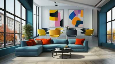 Modern office with abstract art, yellow chairs and a white table. Wall mural