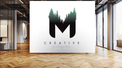 Creative M Letter Logo Idea With Pine Forest Trees. Letter M Design With Pine Tree on Top Wall mural