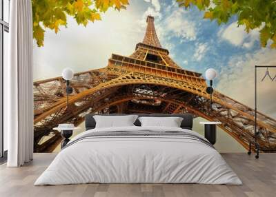 eiffel tower in paris france with golden light rays. Wall mural