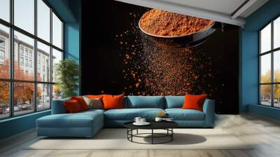 A metal scoop of refined coffee powder on a dark background  Wall mural