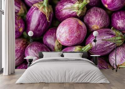 Pile of fresh and natural brinjals background Wall mural