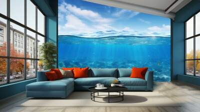 Split view horizon of blue sky with clouds and sunlight and blue underwater ocean. Breathtaking Oceanic Panorama - with copy space to insert ads. Wall mural