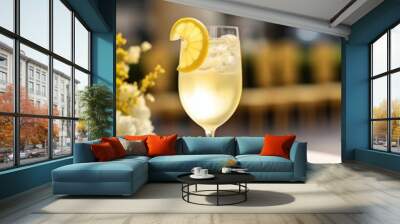 A glass of cocktail French 75 on blurry luxury background. Wall mural