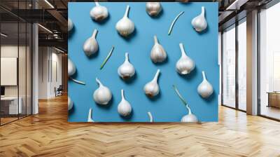 Garlics pattern on green background. Wall mural