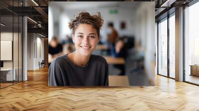 Smiling beautiful caucasian female college student in classroom Wall mural