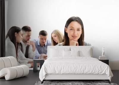 Businesswoman with colleagues in the background on a transparent background Wall mural