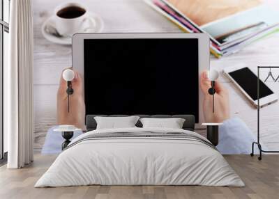 Digital tablet computer with isolated screen in female hands Wall mural