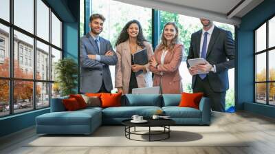 Group portrait of a professional business team looking confidently at camera. Wall mural