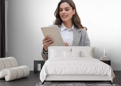 Young smiling businesswoman working on digital tablet on a transparent background Wall mural