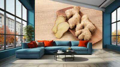 Fresh Ginger (Zingiber officinale) or Jahe on wooden plate 
 Wall mural