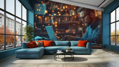 Man Working On Laptop With Blurred Lights Wall mural