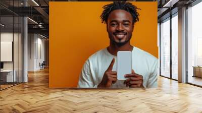 Smiling Man Holding a Phone Wall mural