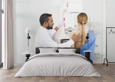 Doctor Standing Assisting Patient Undergoing Mammogram X-ray Tes Wall mural